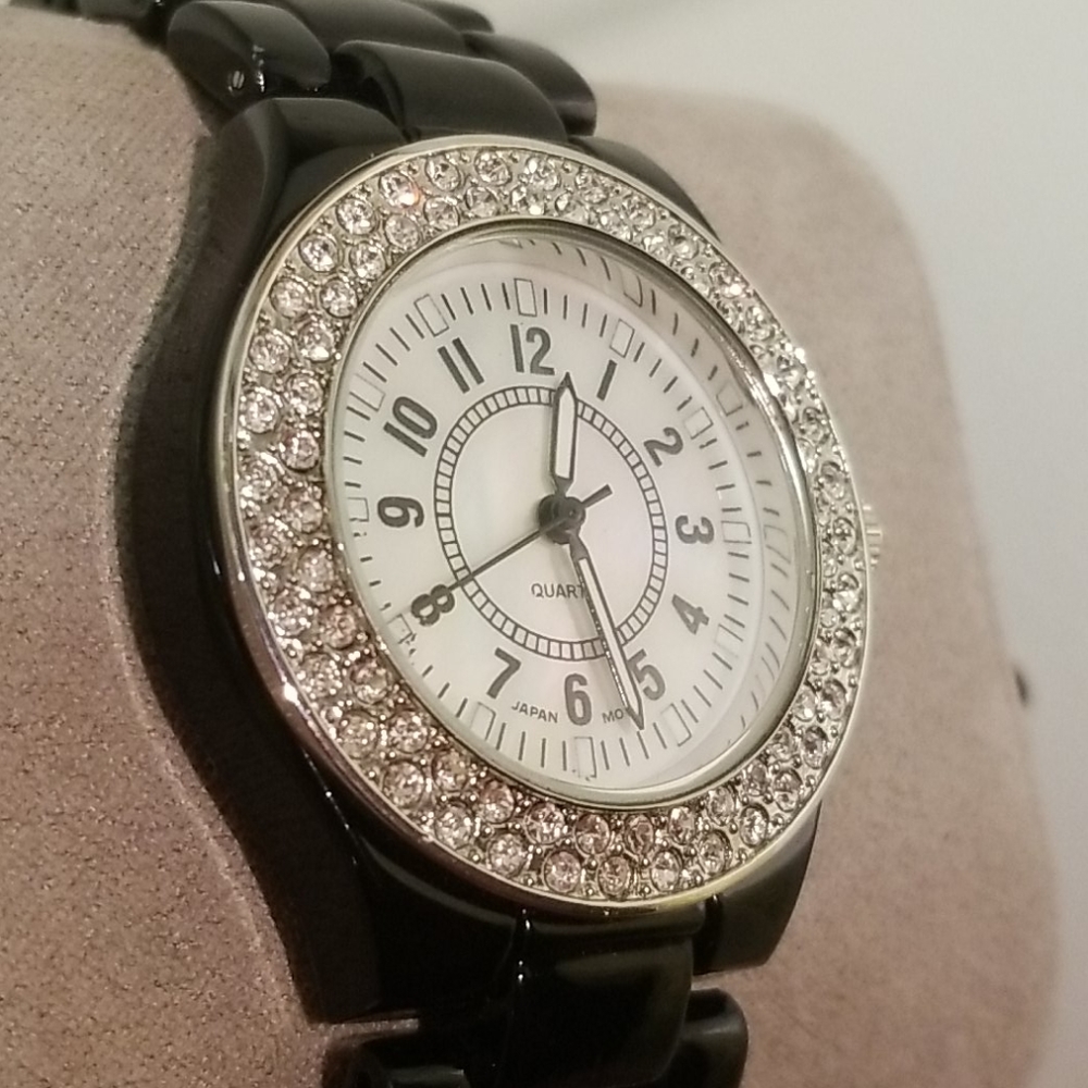 Womens diamond bezel mother of pear face watch